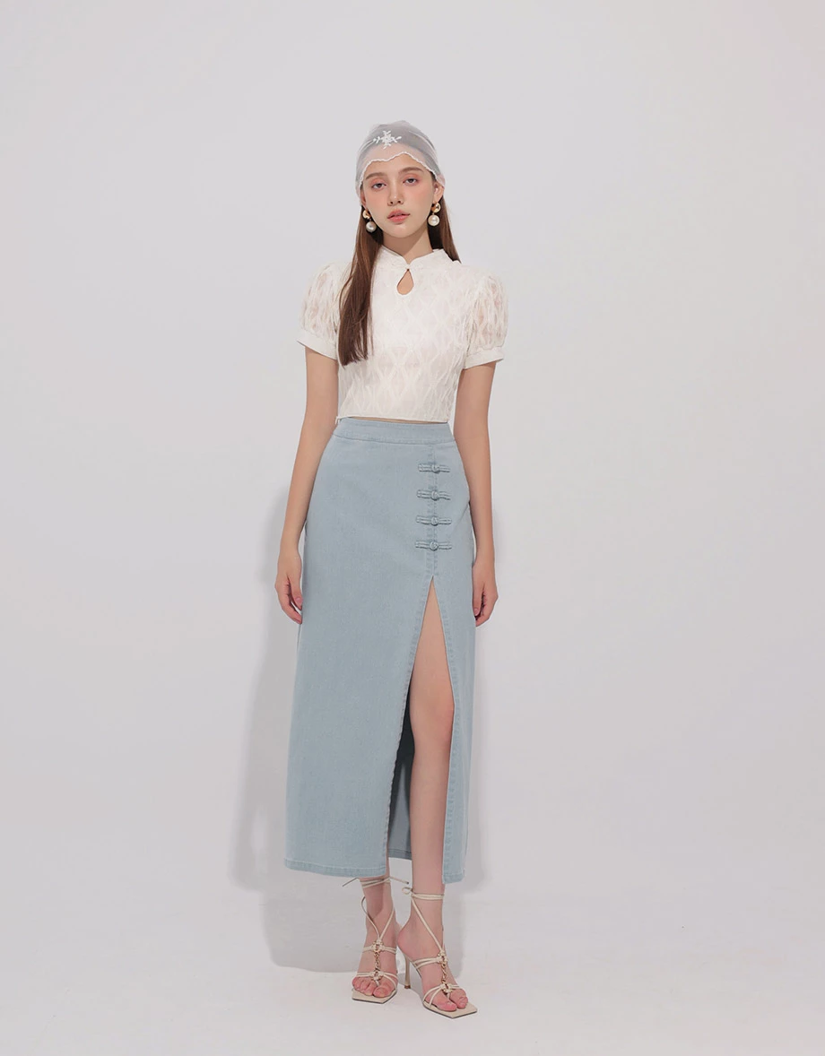 細閃波浪織紋澎袖旗袍領短版上衣