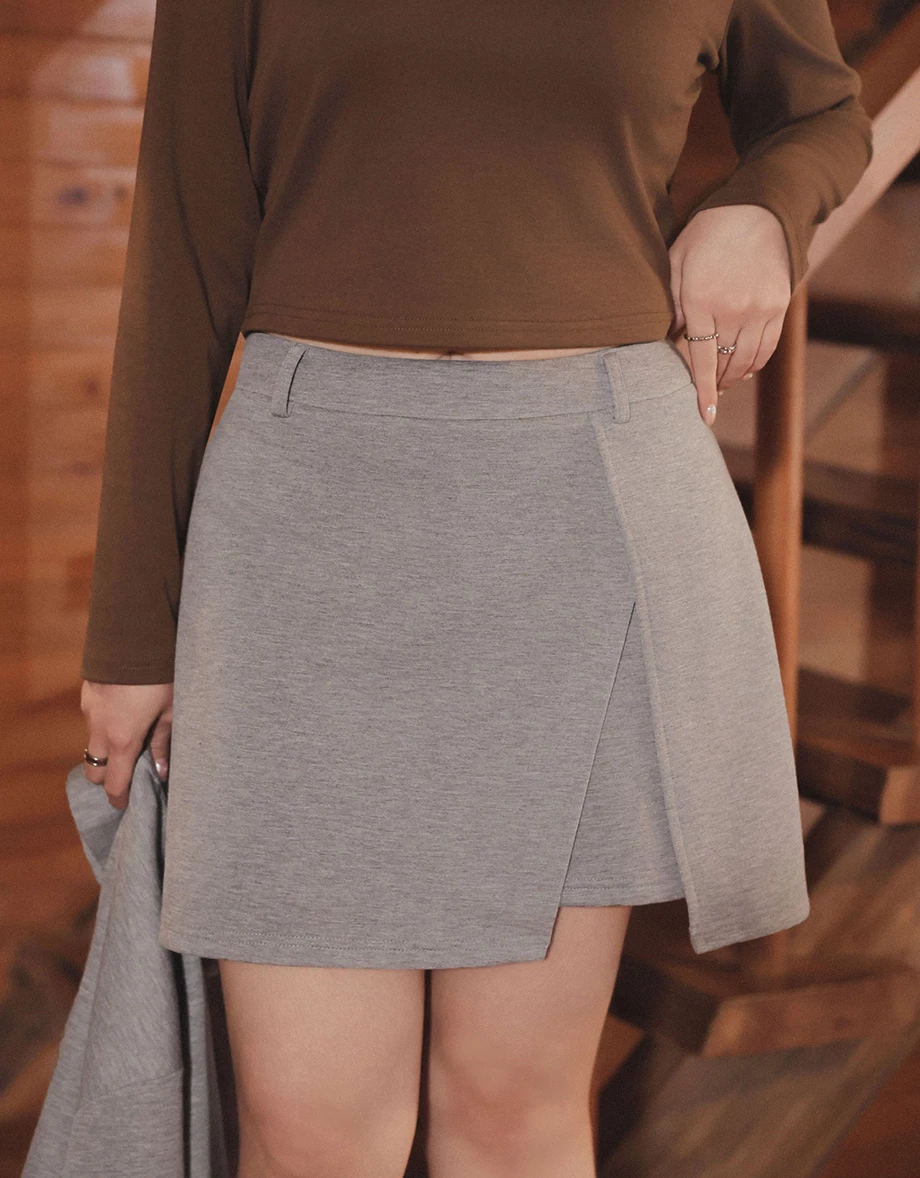 High Waisted Sleek Front Wrap Asymmetric Hem Mini Skirt High Waisted Sleek Front Wrap Asymmetric Hem Mini Skirt