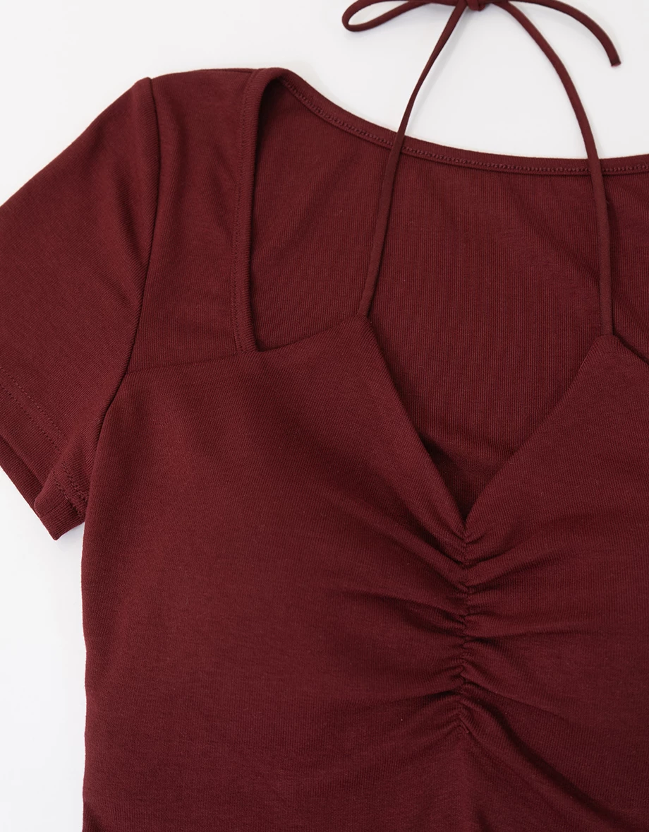 V領抓皺繞頸綁帶拼接短袖短版上衣(附胸墊)