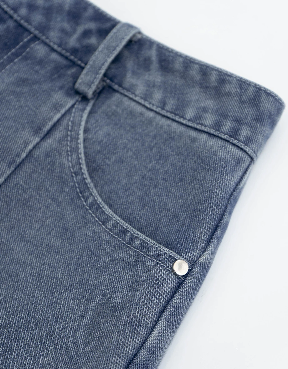 Low Rise Washed Denim Distressed Hem Mini Skirt