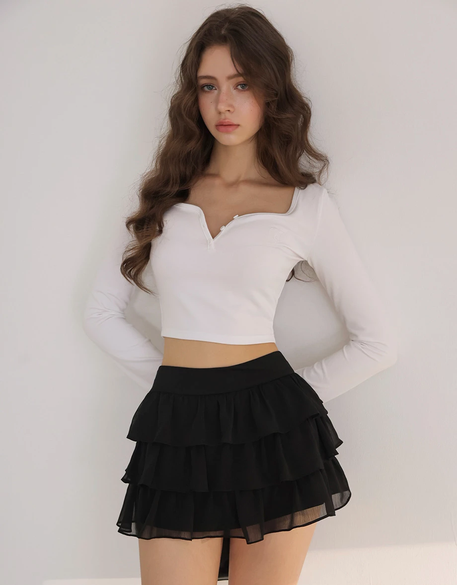 【柔霧砂洗莫代爾】愛心刺繡U領排扣長袖短版上衣