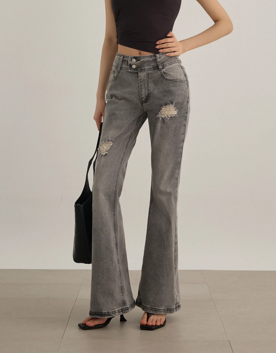 雙扣水洗刷破修身小喇叭牛仔褲