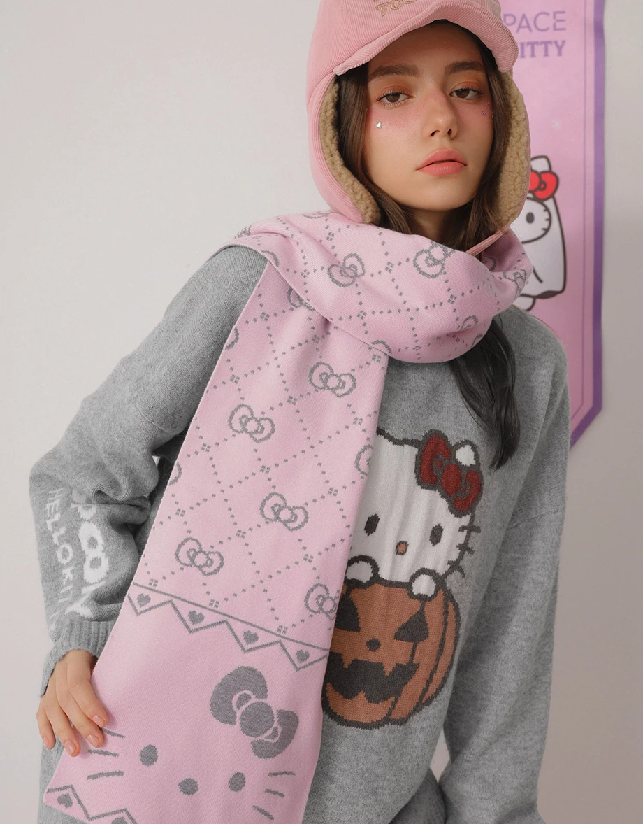 【Hello Kitty】彩色緹花圖案圓領長袖寬版毛衣