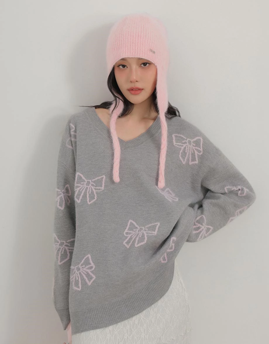 Allover Bow Jacquard V Neck Oversized Knit Sweater Allover Bow Jacquard V Neck Oversized Knit Sweater