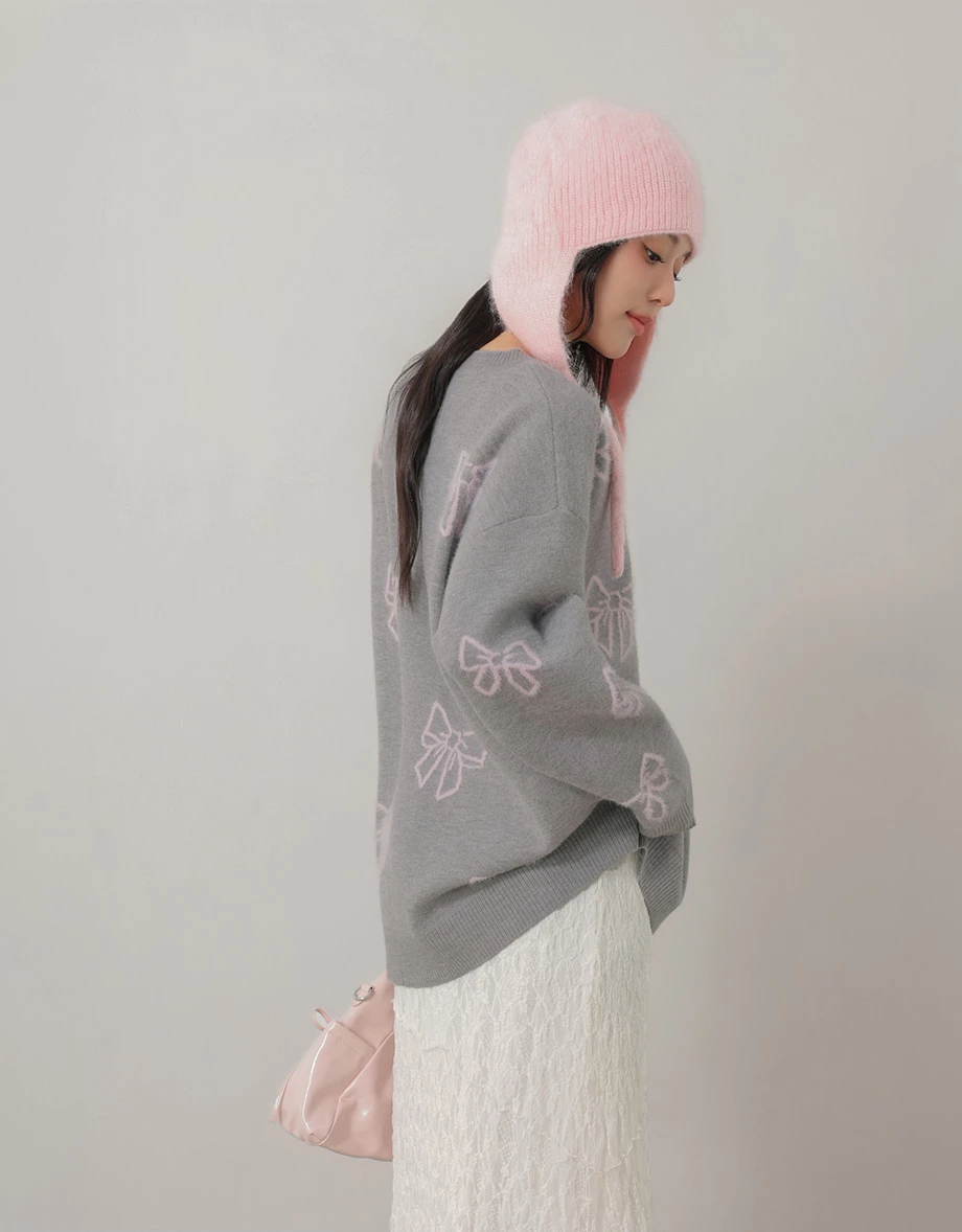 Allover Bow Jacquard V Neck Oversized Knit Sweater Allover Bow Jacquard V Neck Oversized Knit Sweater