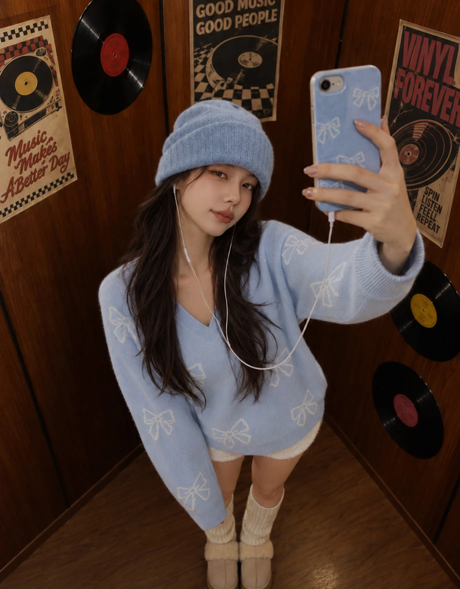 Allover Bow Jacquard V Neck Oversized Knit Sweater Allover Bow Jacquard V Neck Oversized Knit Sweater